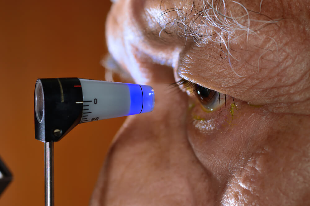 An older man receiving a test for glaucoma.