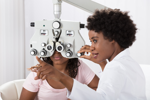 lady receiving eye exam