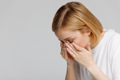 Woman suffering from dry eyes