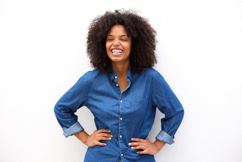 Young woman smiling after LASIK eye surgery