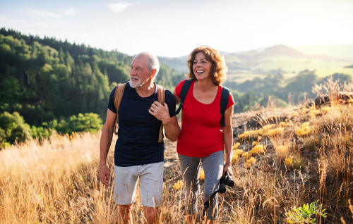 Older couple hiking with cataracts